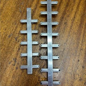 Two Silver Metal Brackets. X-ray or film Negative for developing dipping.